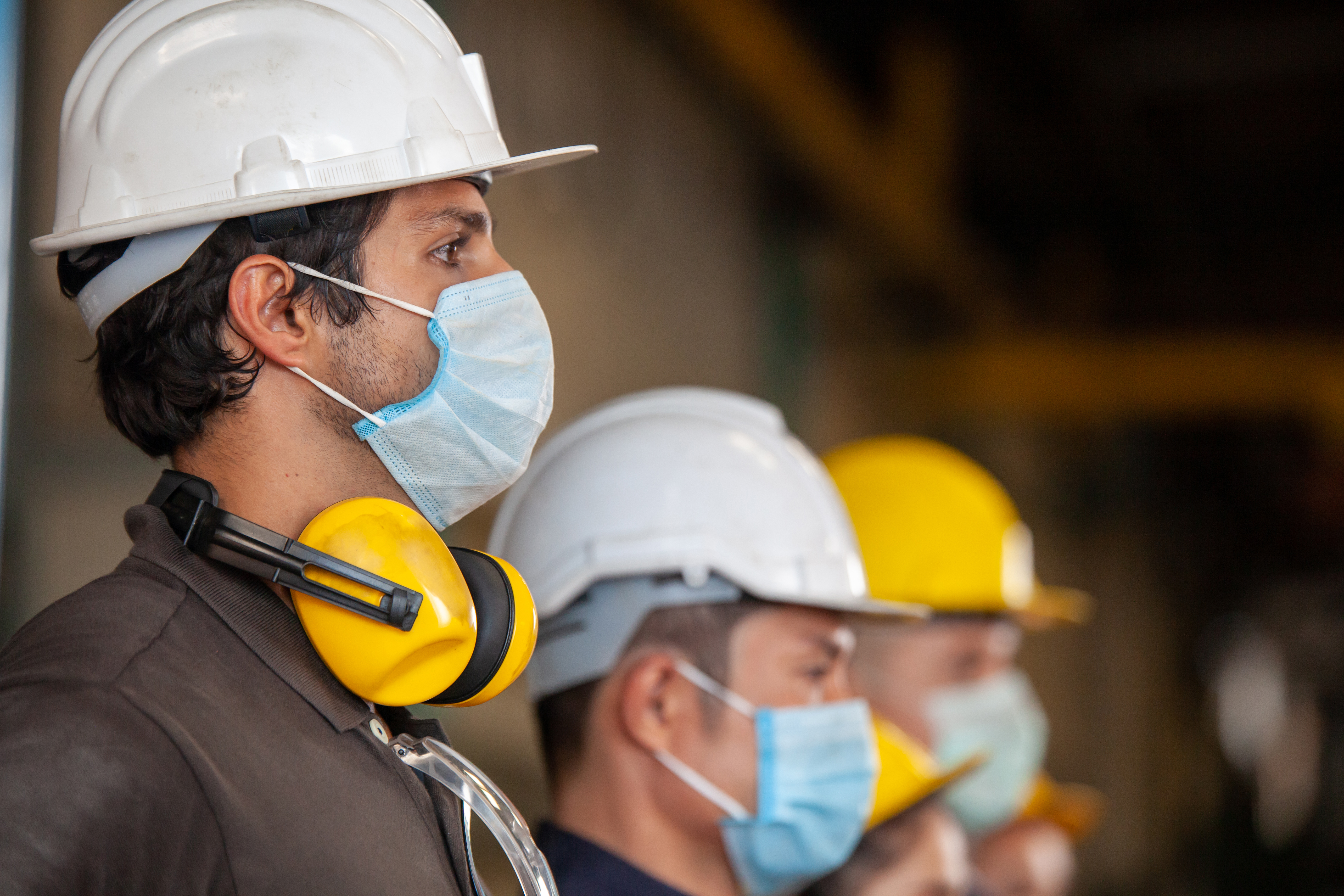 construction workers with mask on